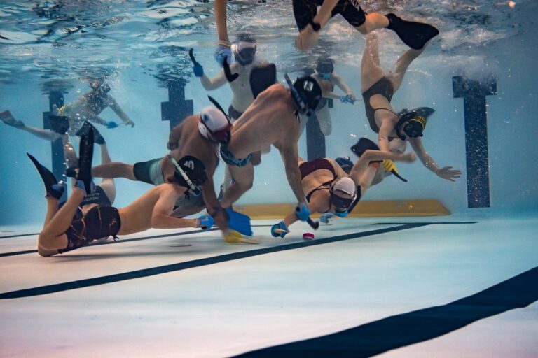 The underwater hockey team playing at Margaret River Recreation Centre swimming pool.
